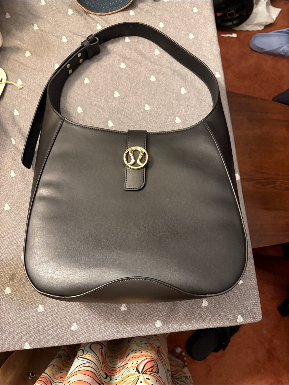 lululemon athletica Black Leather Shoulder Bag with Gold Emblem